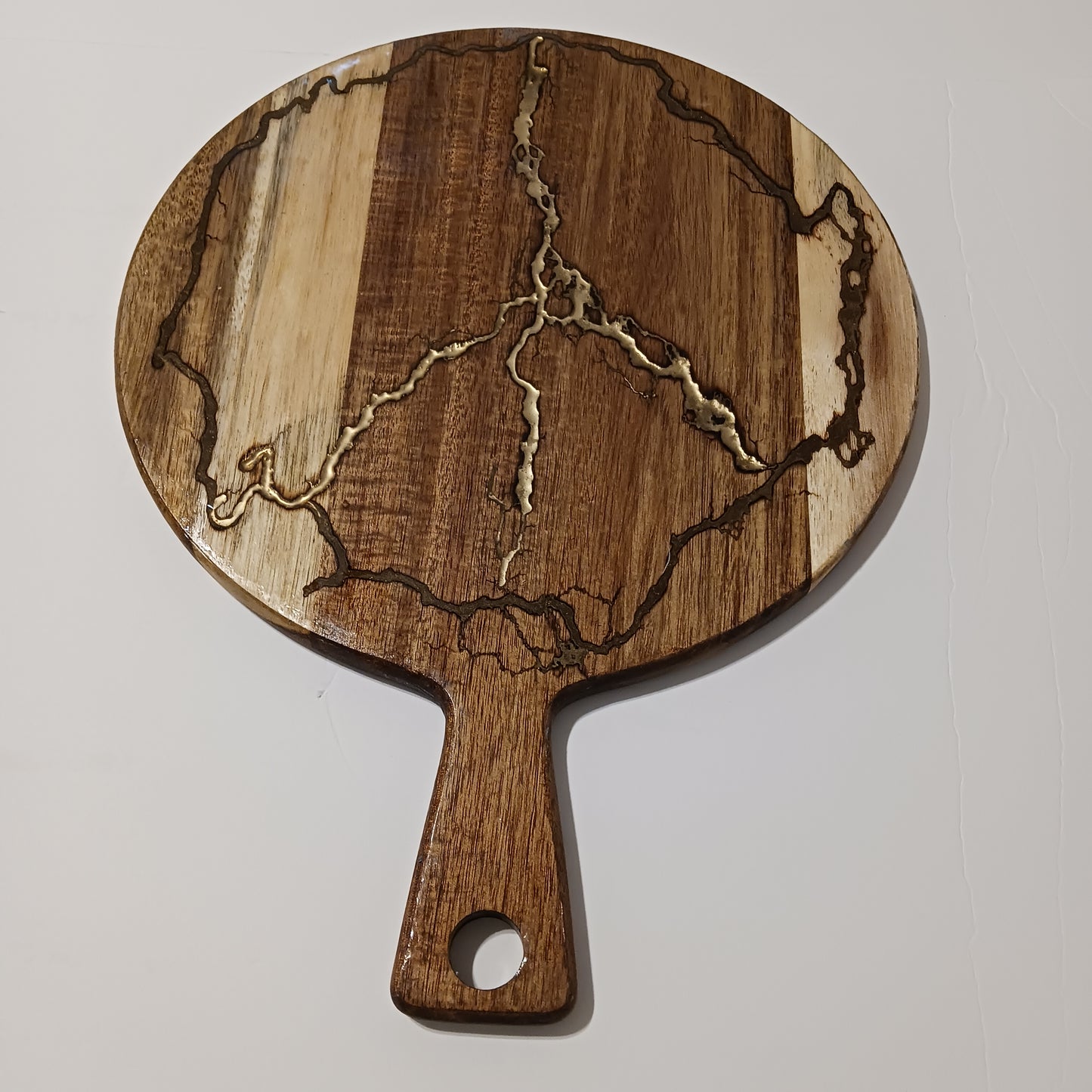 Glossy covered peace charcuterie board