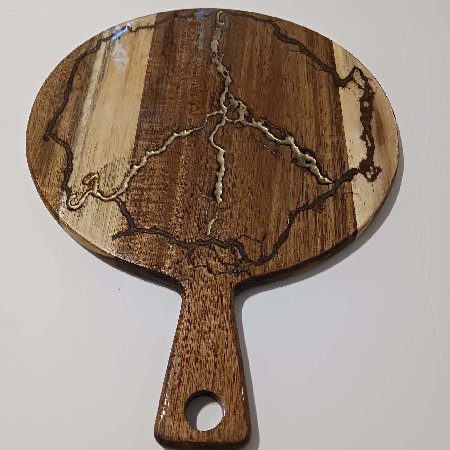 Glossy covered peace charcuterie board